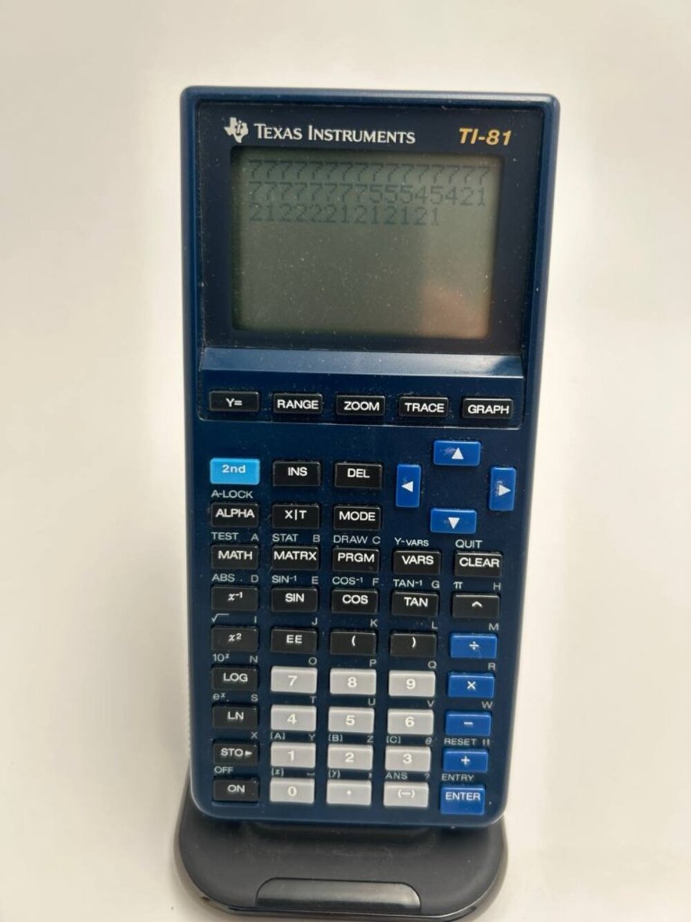 Vintage Texas Instruments TI-81 graphing calculator in dark blue/grey finish! 🧮